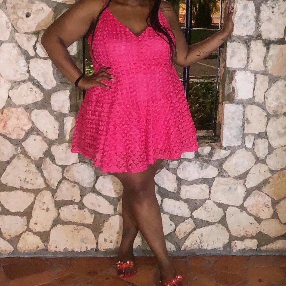 Flared rosette pink dress